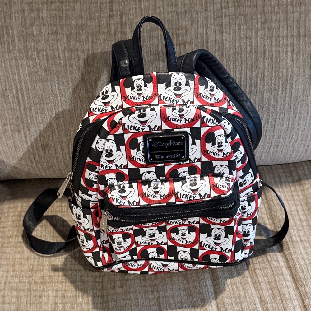 The original Mickey Mouse Club lounge flytrDisney Black and Red Mickey backpack